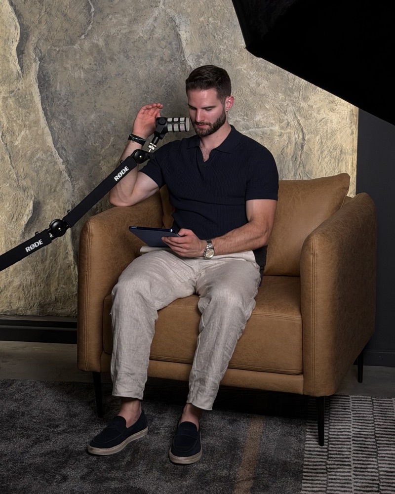Jax recording a podcast in the studio